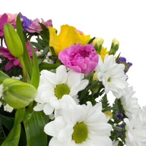 Close up right side shot bright mixed fresh flower bouquet arrangement